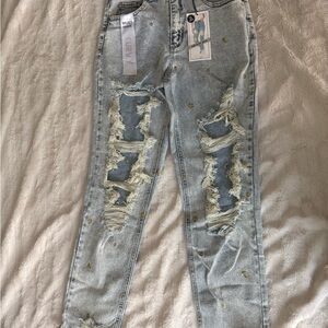 Distressed Light Blue Jeans